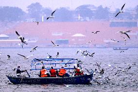 Indian People Take Boat Ahead of the upcoming Maha Kumbh Mela