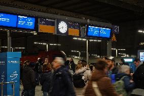 Travelers At Munich Central Station During The Temporary Suspension Of Train Services