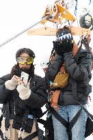 Les Arcs Lina El Arabi and Berangere McNeese Zipline