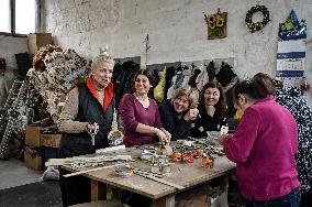 Volunteers make trench candles for soldiers in Zaporizhzhia