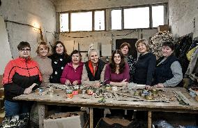 Volunteers make trench candles for soldiers in Zaporizhzhia