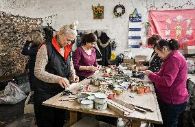 Volunteers make trench candles for soldiers in Zaporizhzhia