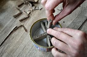 Volunteers make trench candles for soldiers in Zaporizhzhia