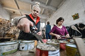 Volunteers make trench candles for soldiers in Zaporizhzhia