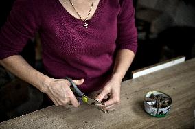 Volunteers make trench candles for soldiers in Zaporizhzhia