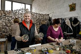 Volunteers make trench candles for soldiers in Zaporizhzhia