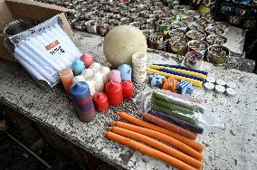 Volunteers make trench candles for soldiers in Zaporizhzhia