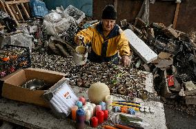 Volunteers make trench candles for soldiers in Zaporizhzhia