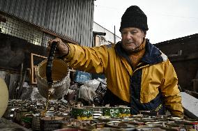 Volunteers make trench candles for soldiers in Zaporizhzhia