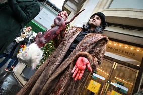 PETA activists in action at Printemps in Paris FA