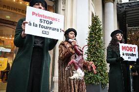 PETA activists in action at Printemps in Paris FA