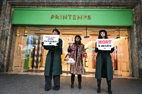 PETA activists in action at Printemps in Paris FA