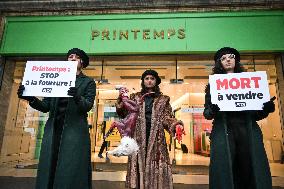 PETA activists in action at Printemps in Paris FA