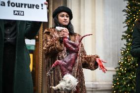 PETA activists in action at Printemps in Paris FA