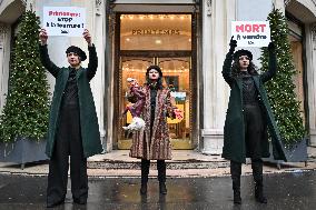 PETA activists in action at Printemps in Paris FA