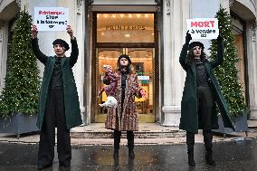 PETA activists in action at Printemps in Paris FA