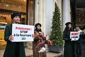 PETA activists in action at Printemps in Paris FA