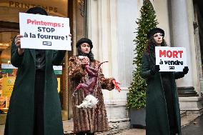 PETA activists in action at Printemps in Paris FA