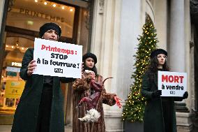 PETA activists in action at Printemps in Paris FA