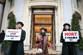 PETA activists in action at Printemps in Paris FA