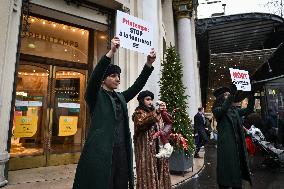 PETA activists in action at Printemps in Paris FA