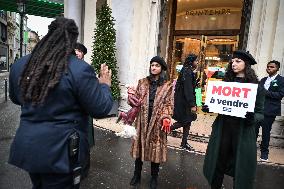 PETA activists in action at Printemps in Paris FA