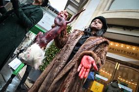 PETA activists in action at Printemps in Paris FA