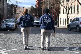 Crime Scene Investigators At Scene Of Man Dead After Being Shot In Mount Hope Section Of Bronx New York