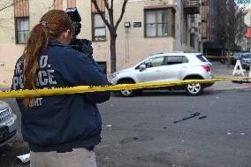 Crime Scene Investigators At Scene Of Man Dead After Being Shot In Mount Hope Section Of Bronx New York