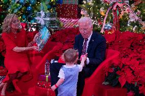 President Joe Biden and first lady Dr. Jill Biden pay a holiday visit to patients and families at Childrens National Hospital