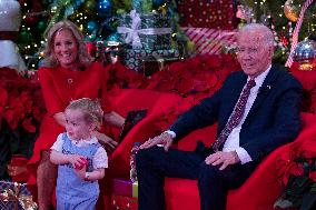 President Joe Biden and first lady Dr. Jill Biden pay a holiday visit to patients and families at Childrens National Hospital