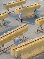 Hanging Noodles For Drying