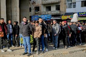 Long queues outside settlement center for temporary protection cards - Syria