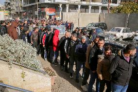 Long queues outside settlement center for temporary protection cards - Syria