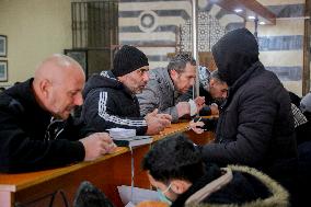 Long queues outside settlement center for temporary protection cards - Syria