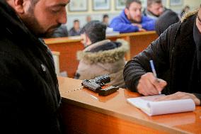 Long queues outside settlement center for temporary protection cards - Syria