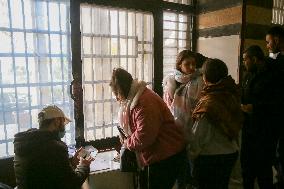 Long queues outside settlement center for temporary protection cards - Syria