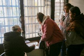 Long queues outside settlement center for temporary protection cards - Syria