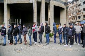 Long queues outside settlement center for temporary protection cards - Syria