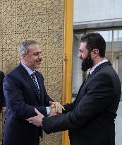 Turkish FM Hakan Fidan meets HTS Leader Ahmed al-Sharaa - Damascus