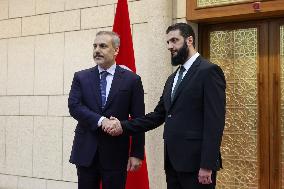 Turkish FM Hakan Fidan meets HTS Leader Ahmed al-Sharaa - Damascus