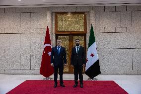 Turkish FM Hakan Fidan meets HTS Leader Ahmed al-Sharaa - Damascus