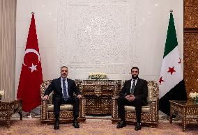 Turkish FM Hakan Fidan meets HTS Leader Ahmed al-Sharaa - Damascus