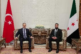 Turkish FM Hakan Fidan meets HTS Leader Ahmed al-Sharaa - Damascus