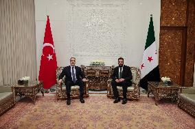 Turkish FM Hakan Fidan meets HTS Leader Ahmed al-Sharaa - Damascus