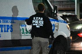 NYPD Crime Scene Investigators Stage At 60th Precinct In Coney Island Brooklyn New York Where Suspect In Fire Setting Attack On