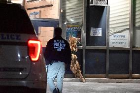 NYPD Crime Scene Investigators Stage At 60th Precinct In Coney Island Brooklyn New York Where Suspect In Fire Setting Attack On