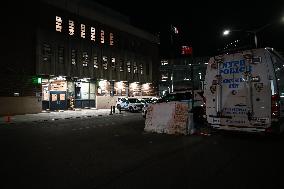 NYPD Crime Scene Investigators Stage At 60th Precinct In Coney Island Brooklyn New York Where Suspect In Fire Setting Attack On