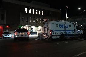 NYPD Crime Scene Investigators Stage At 60th Precinct In Coney Island Brooklyn New York Where Suspect In Fire Setting Attack On