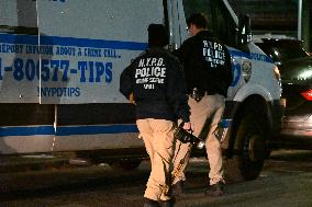 NYPD Crime Scene Investigators Stage At 60th Precinct In Coney Island Brooklyn New York Where Suspect In Fire Setting Attack On